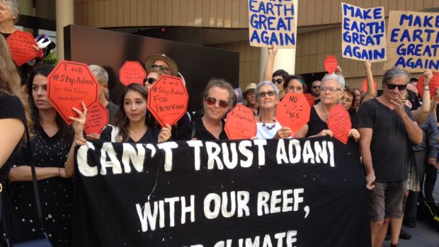 Protesters gathered as Adani's local mining chief executive Jeyakumar Janakaraj spoke at a business lunch in Brisbane ...